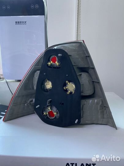 Фонарь задний Toyota Corolla (E120) 00-04