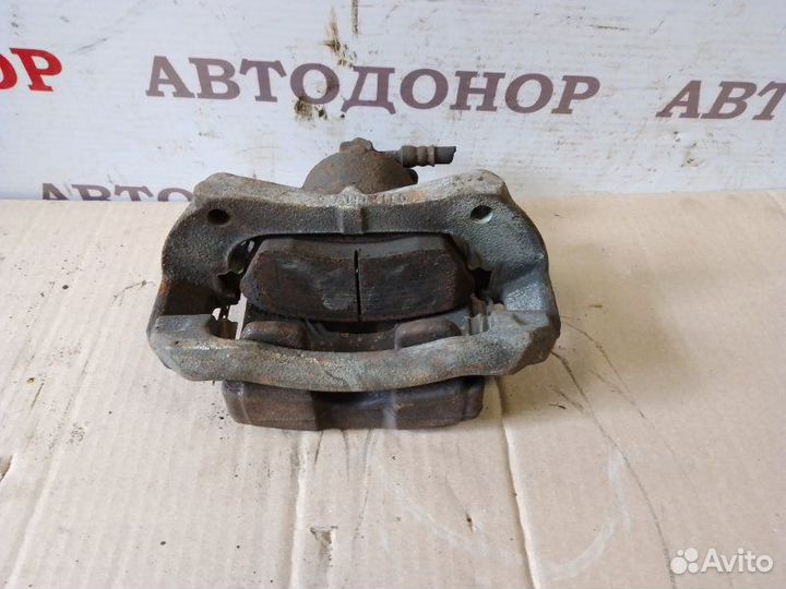 Суппорт тормозной передний правый Opel Astra J