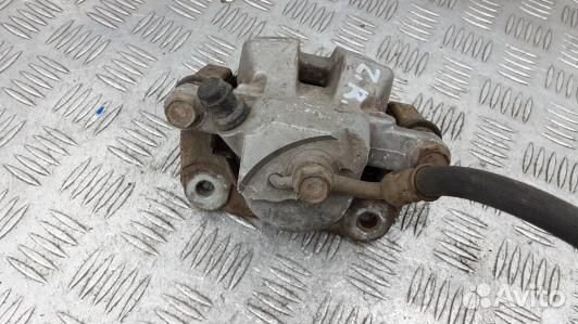 Суппорт тормозной задний правый toyota RAV 4 ZSA3