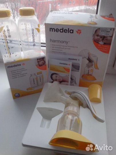 Молокоотсос ручной Medela+ бутылочки 250мл