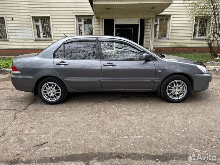 Mitsubishi Lancer 1.6 МТ, 2006, 219 000 км