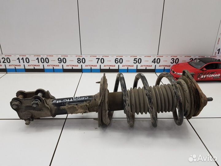 Амортизатор передний правый с пружиной