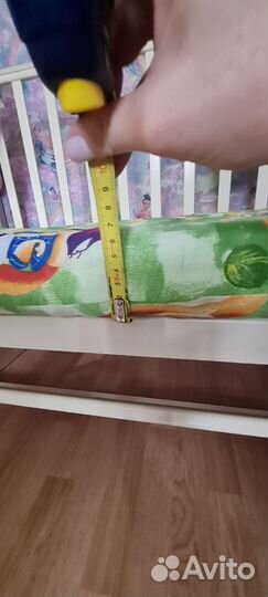 Детская кроватка с маятником