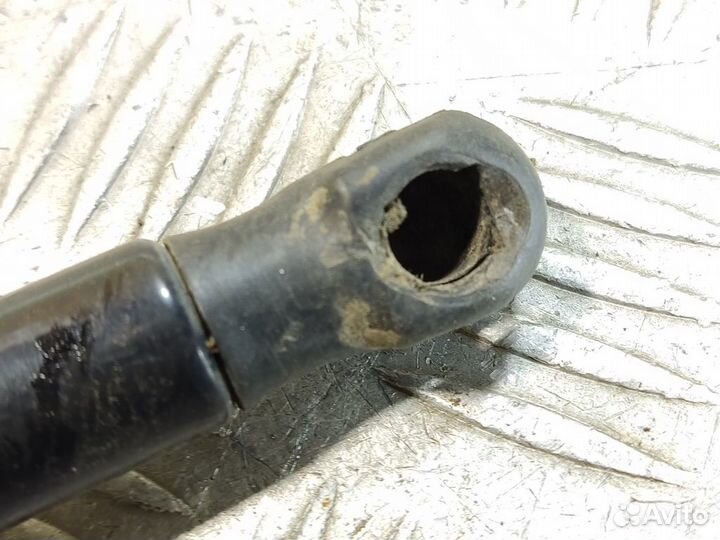 Амортизатор двери багажника Opel Astra H