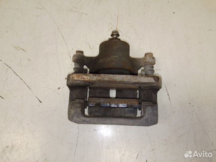 Суппорт тормозной задний левый Mazda Cx-7 ER3P