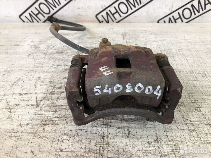 Суппорт передний тормозной Nissan Almera N15