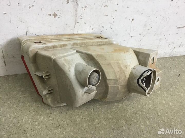 Фонарь задний в бампер левый Toyota Land Cruiser