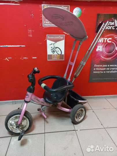 Трехколесный велосипед с ручкой