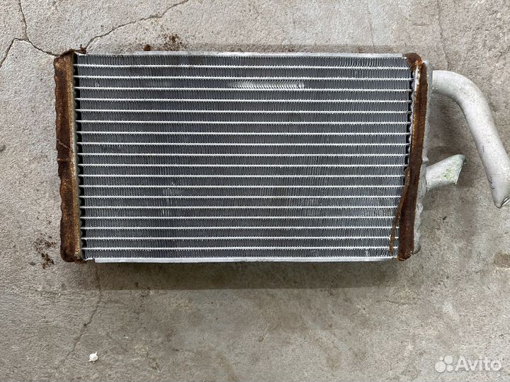 Радиатор печки на Lancer Cedia