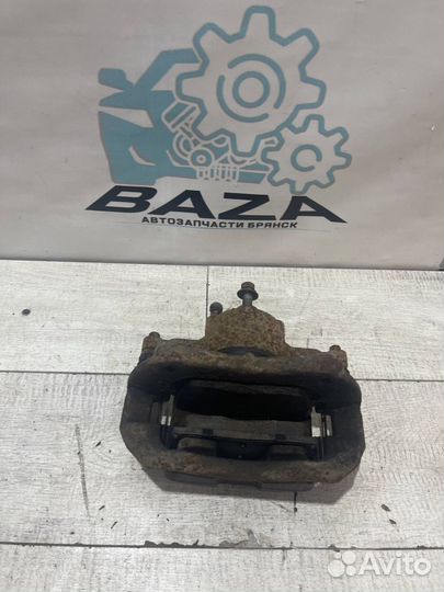 Суппорт передний левый Chevrolet Cruze