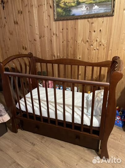 Детская кроватка с продольным маятником Лель