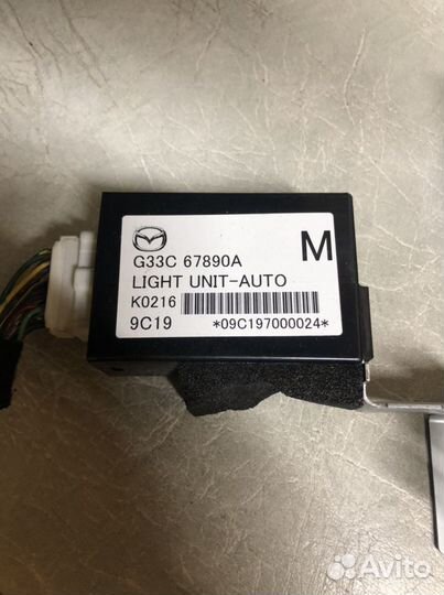 Блок управления светом Mazda