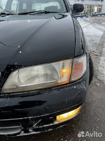 Фара левая nissan primera p11