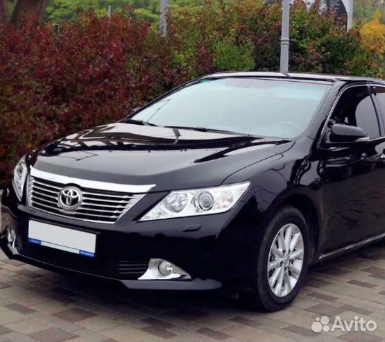 Стекло левой фары Toyota Camry 50