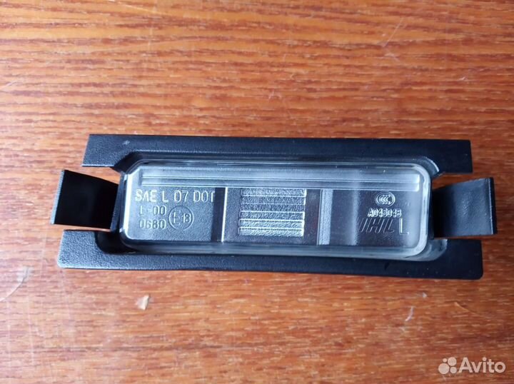 Фонарь подсветки номера kia