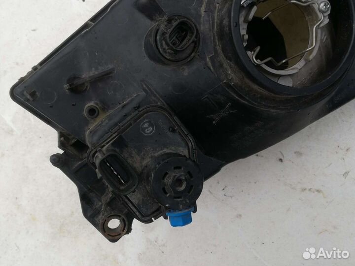 Фара Мазда Демио 1