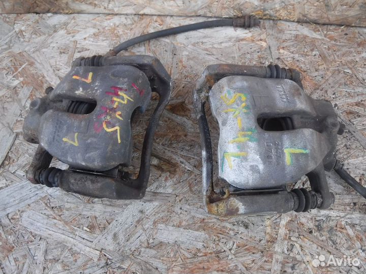 Суппорт тормозной передний Suzuki SX4 Сузуки