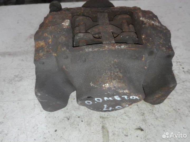 Суппорт задний левый Opel Omega