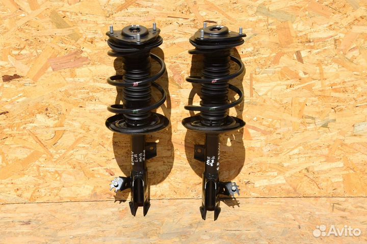 Стойка амортизатора передняя Тойота Рав 4 50 кузов