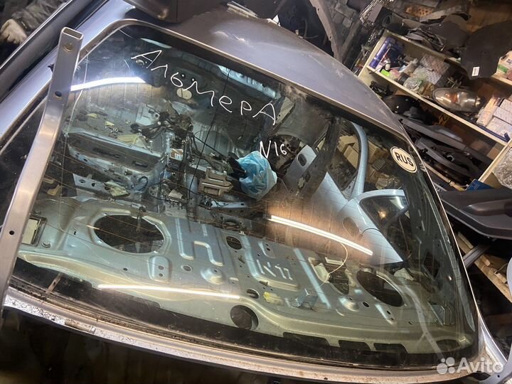 Стекло заднее Nissan Almera N16