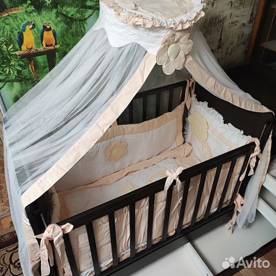 Детская кроватка с поперечным маятником