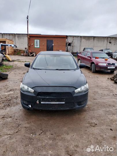 Ремень безопасности задний Mitsubishi Lancer CY