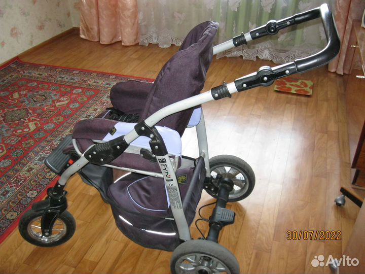 Детская прогулочная коляска