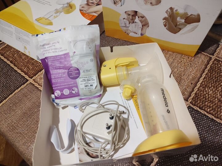 Молокоотсос электрический Medela mini electric