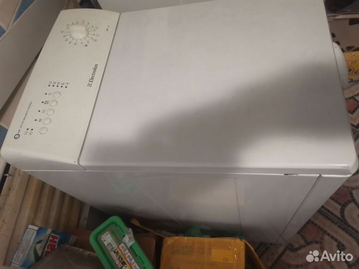 Вертикальная стиральная машинка электролюкс 825