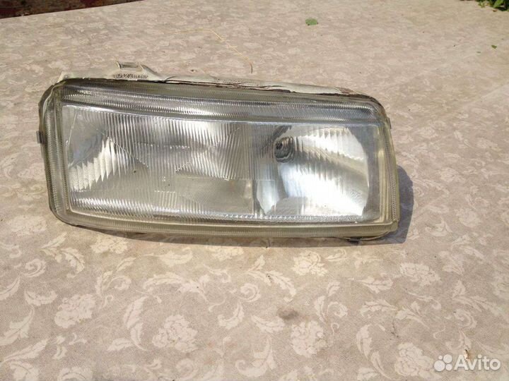 Стекло фары passat b4