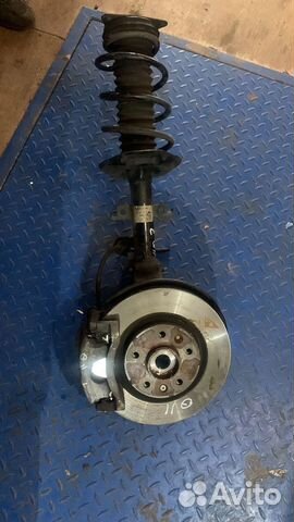 Стойка амортизатора перед. лев. Nissan Qashqai J11