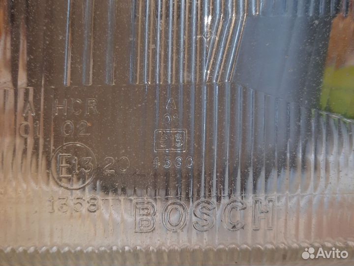 Стекло фары левой Audi 80. B4