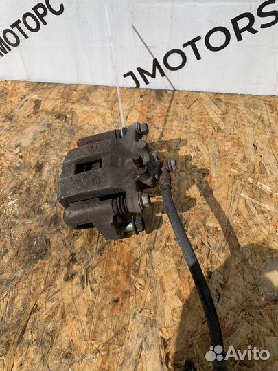 Суппорт тормозной задний правый Nissan X-Trail T31