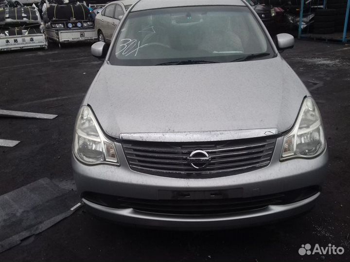 Замок двери задний левый Nissan Bluebird Sylphy