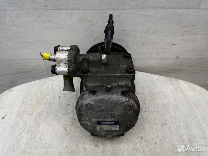 Компрессор кондиционера Kia Carnival 13250-25600