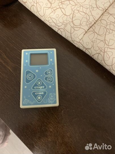 Детская кроватка с маятником