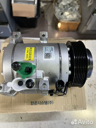 Компрессор кондиционе grand starex 97701-4H010