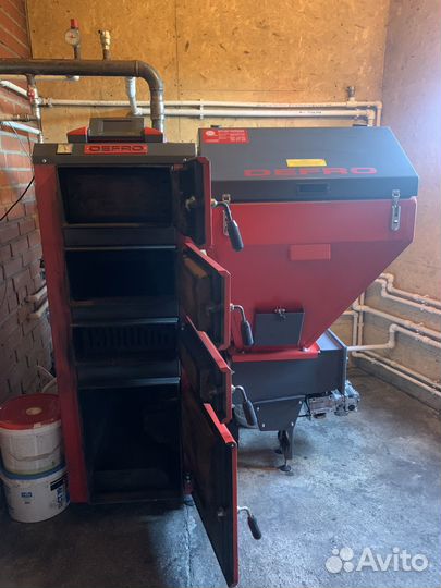 Автоматический твердотоплевный котел Defro