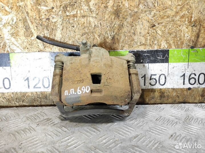 Суппорт передний правый Nissan Almera Classic