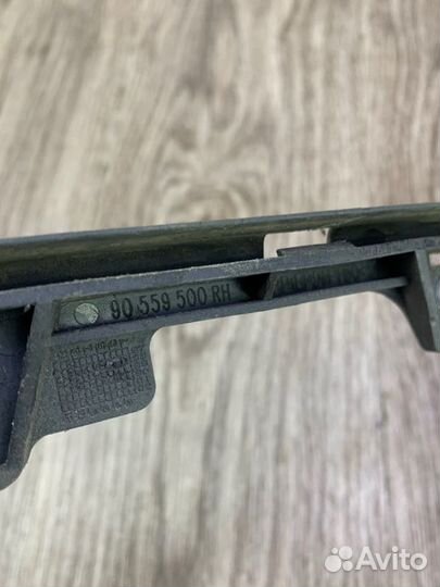 Крепление бампера переднее правое Opel Astra G