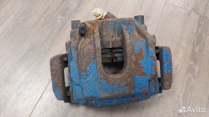 Суппорт тормозной передний левый Bmw 7 Series E38