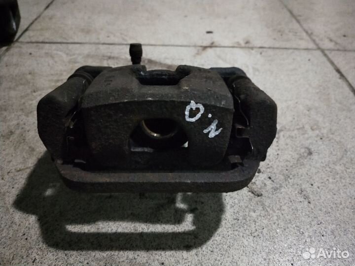 Суппорт тормозной задний Nissan Qashqai J10