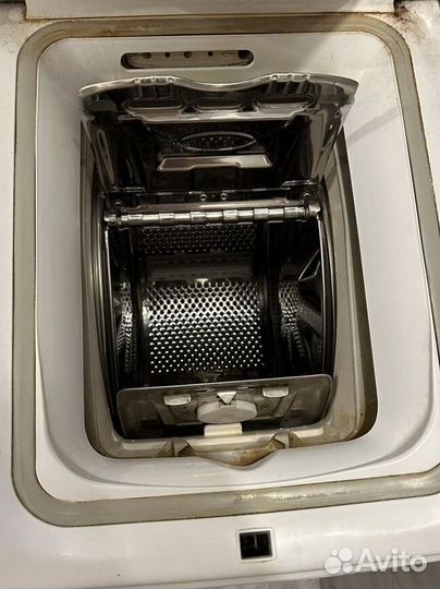 Стиральная машинка с вертикальной загрузкой