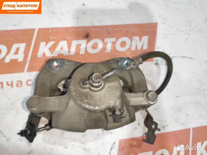 Суппорт тормозной передний левый Kia Sportage 4