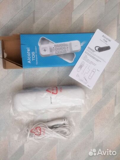 Телефон проводной Alkatel T06, новый