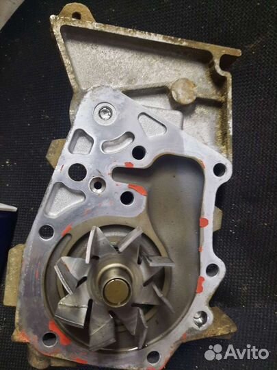 Помпа Renault logan 1