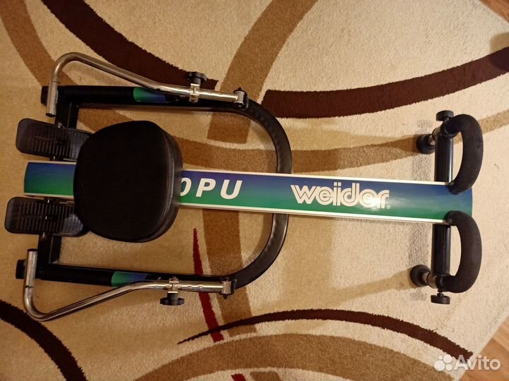 Гребной тренажер