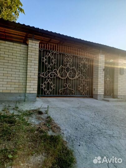 Ворота ручные откатные арочные кованные