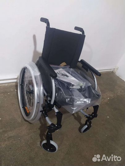 Инвалидная коляска