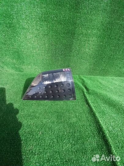 Фонарь левый в крышку mitsubishi outlander xl